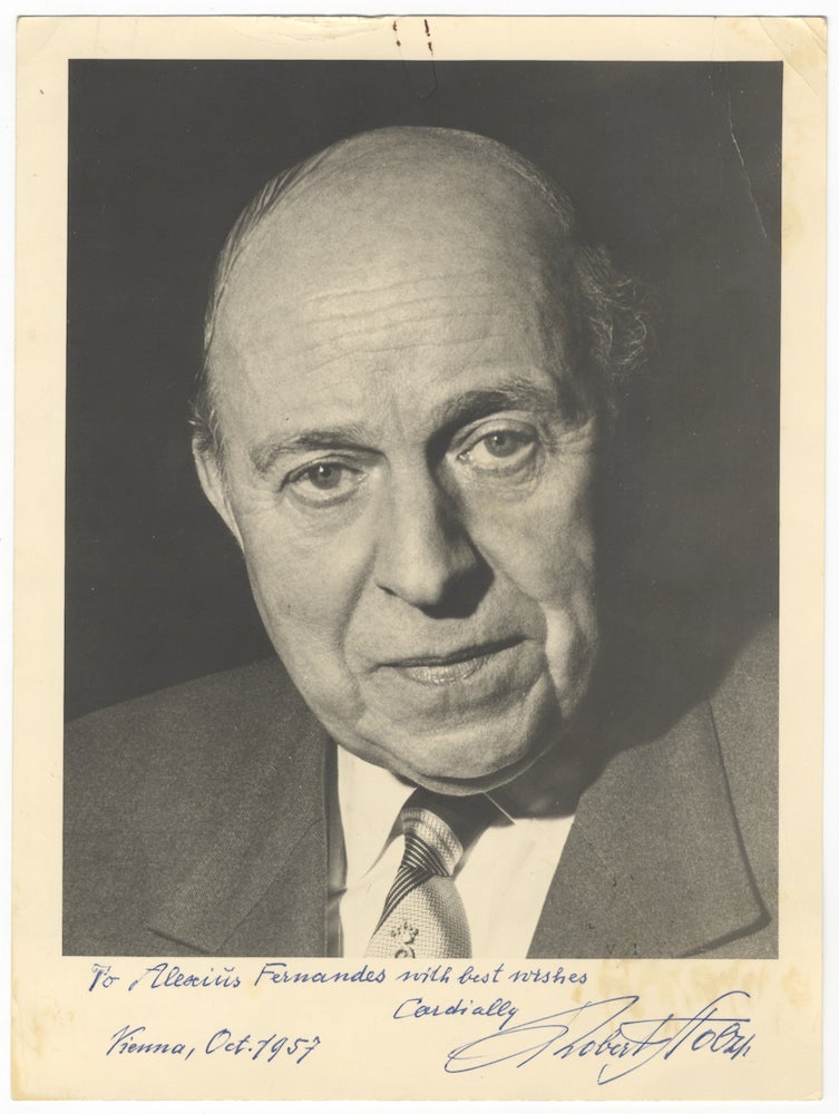 Item #23458 Attractive bust-length photograph of the Austrian composer and conductor in jacket and tie, signed in full, inscribed in dark blue ink to Alexius Fernandes, and dated Vienna, October 1957. Robert STOLZ.