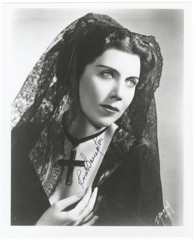 Item #23769 Role portrait photograph of the soprano as [?]Donna Anna in Mozart's Don Giovanni. Signed in full in black ink. Rose BAMPTON.