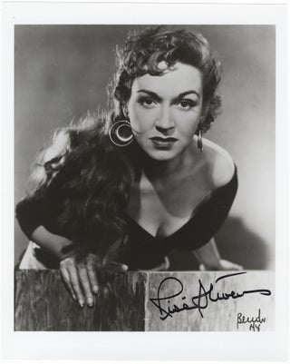 Item #23944 Bust-length role portrait photograph in the title role of Bizet's Carmen, signed in....