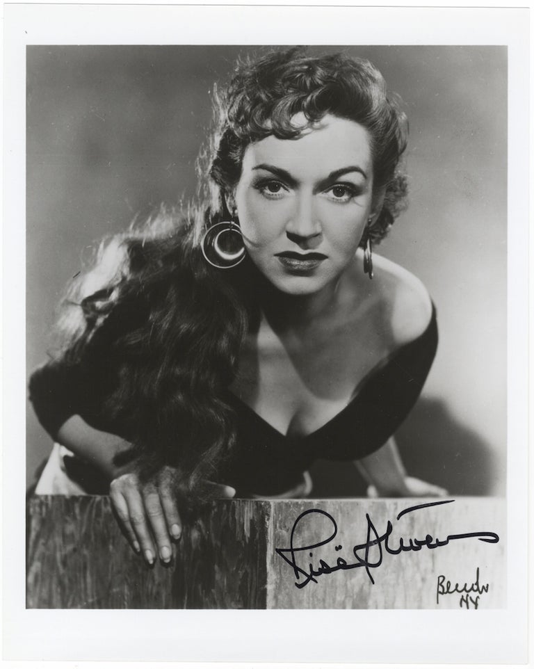 Item #23944 Bust-length role portrait photograph in the title role of Bizet's Carmen, signed in full. Risë STEVENS.