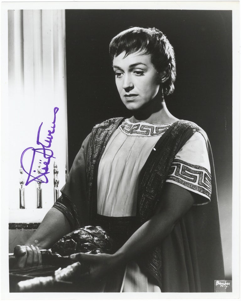 Item #23947 Half-length role portrait photograph in the title role of Gluck's Orfeo, signed in full. Risë STEVENS.