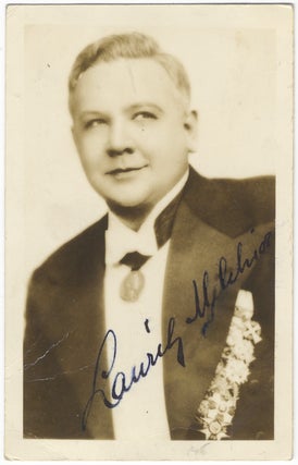 Item #24052 Waist-length photograph in formal attire, signed in full. Lauritz MELCHIOR