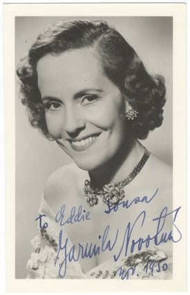 Item #24053 Bust-length postcard photograph signed in full, dated November, 1950, and inscribed...