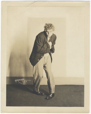 Original full-length role portrait photograph of the prominent American baritone as Tonio in Leoncavallo's Pagliacci together with cut signature laid down to ivory paper mount