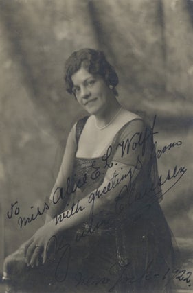 Item #31088 Three-quarter length photograph of the noted Swedish mezzo-soprano, seated, in formal...
