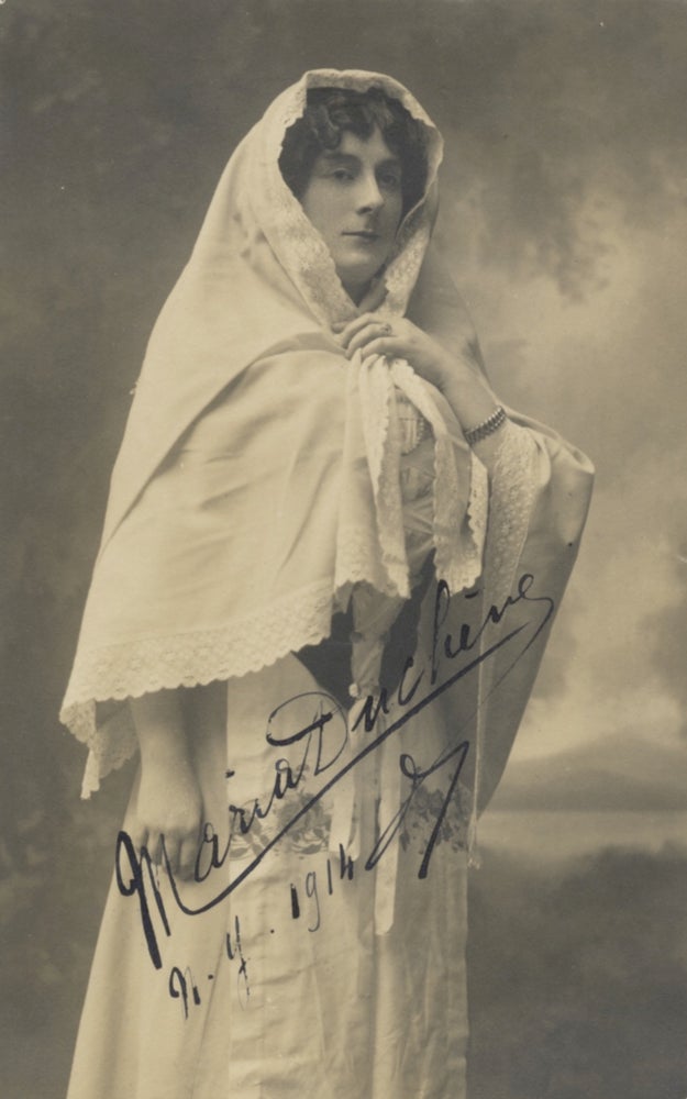 Item #31092 Three-quarter length postcard photograph of the French contralto in role portrait. Signed in full and dated New York, 1914. Maria 1884-? DUCHÈNE.