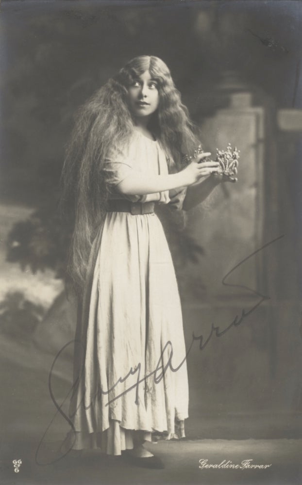 Item #31118 Attractive full-length postcard photograph, ca. 1910, of the important American soprano as Gänsemagd in Humperdinck's opera Königskinder. Signed. Geraldine FARRAR.