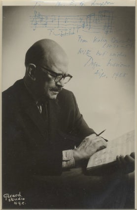 Item #39051 Photograph of the composer, manuscript in hand, with autograph musical quotation from...