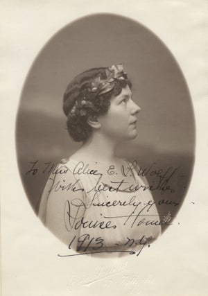 Item #39149 Bust-length oval photograph of the American contralto in profile with a garland in....