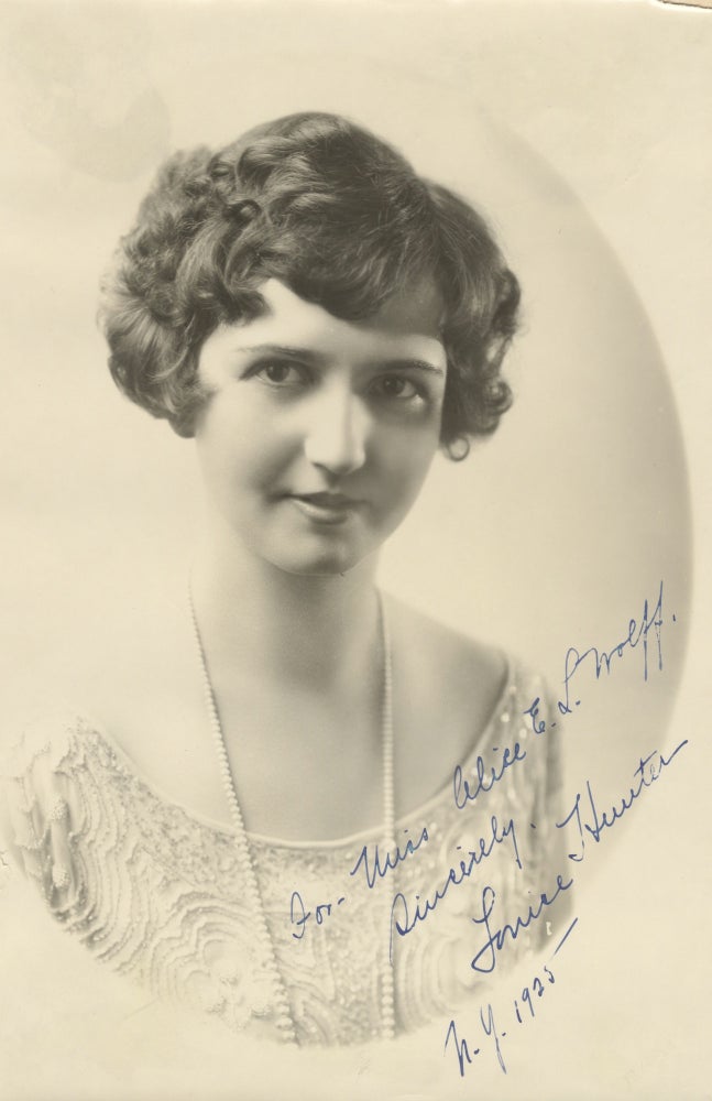 Item #39150 Fine bust-length photograph of the American soprano with autograph signature. Louise HUNTER.
