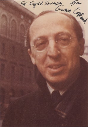 Item #39685 Signed bust-length color photographic image of the composer. Aaron COPLAND